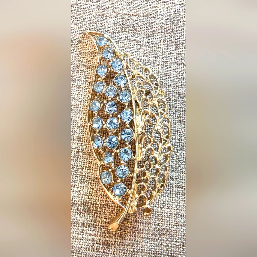 Vintage Gold Leaf Brooch With Light Blue Rhinestones.  Unsigned